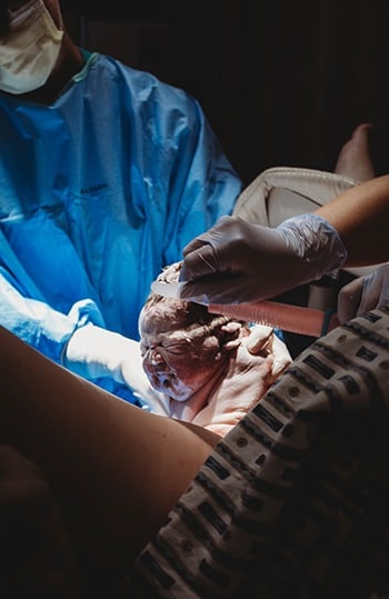 The delivery of a baby is included in the services offered at Sylacauga OBGYN.