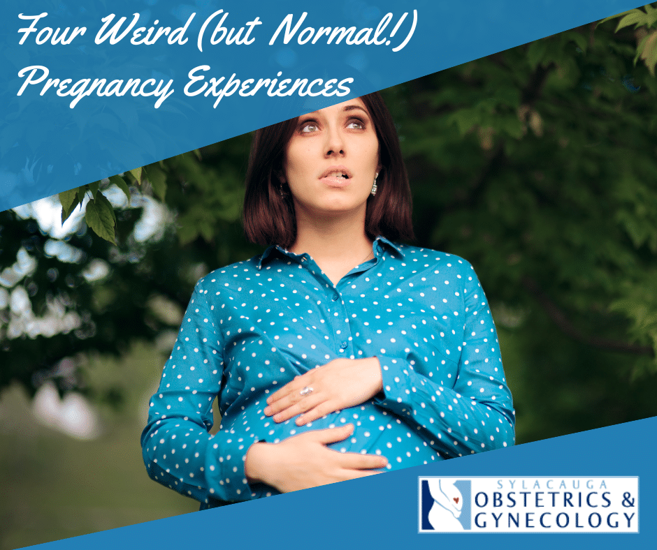 A woman outdoors in a blue polka dot shirt makes a concerned face during her pregnancy